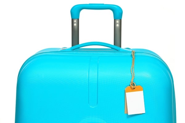 The modern large suitcase with nametag