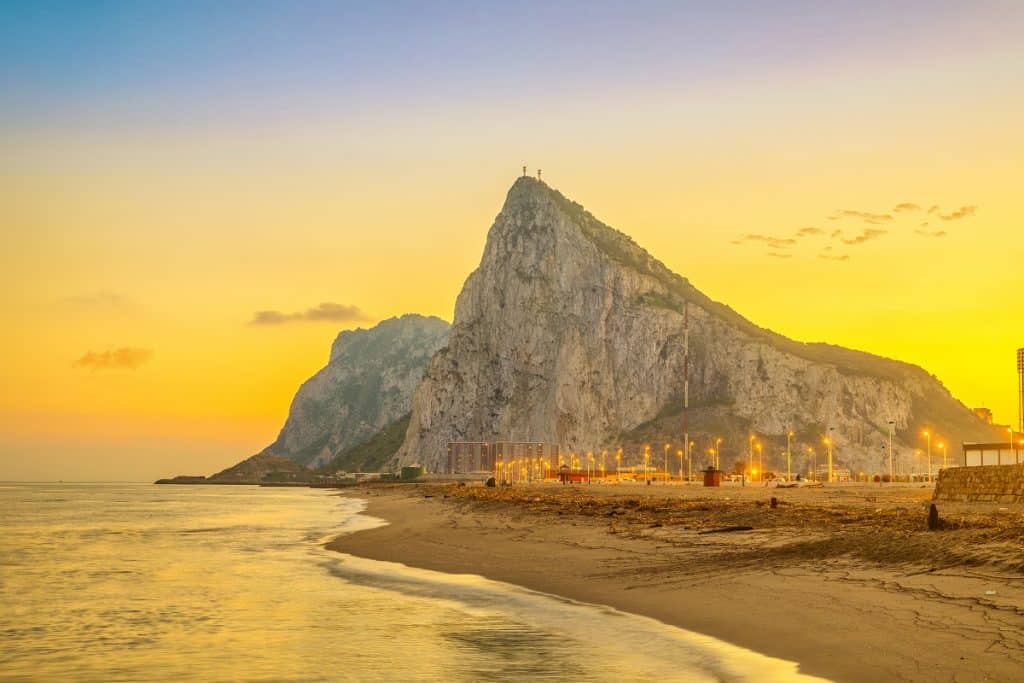 Gibraltar rock at sunset from beach in La Linea de la Concepcion