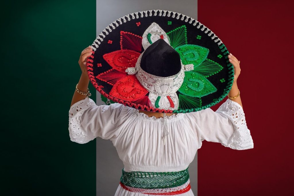 Woman wearing Mexican Hat with the Colors of Mexico