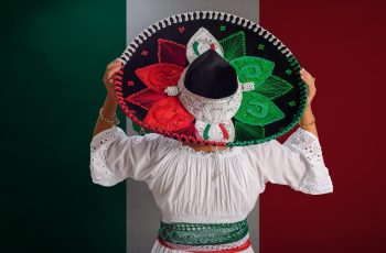 Woman wearing Mexican Hat with the Colors of Mexico