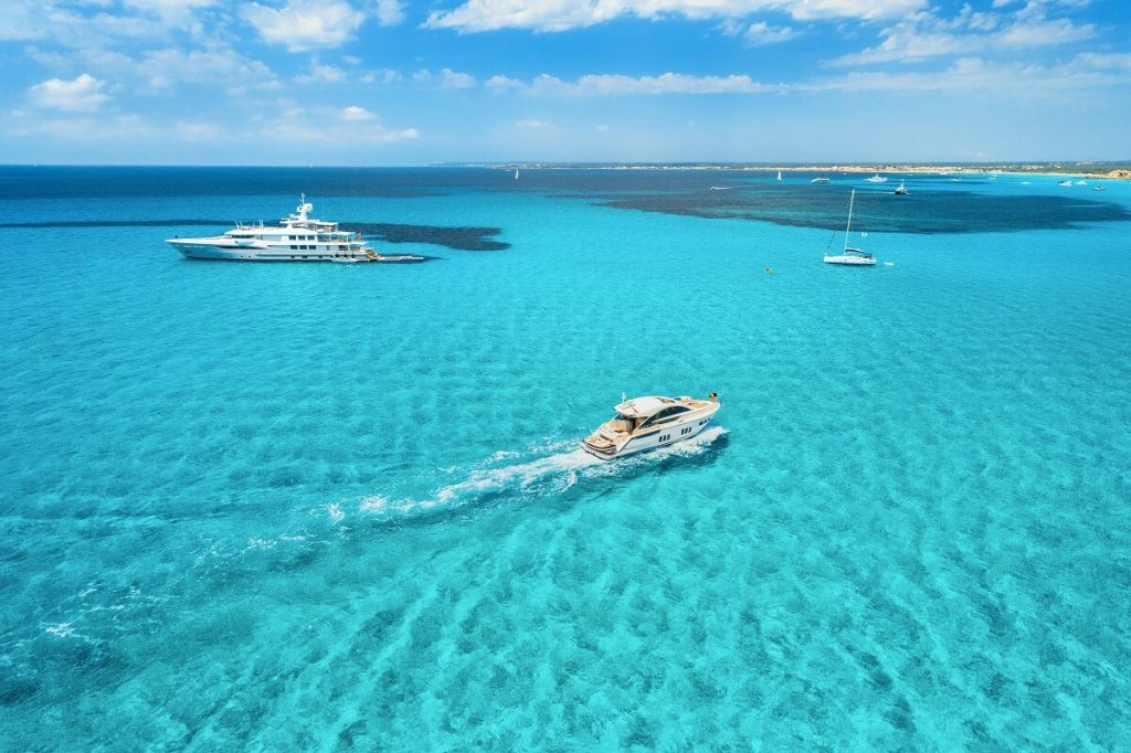 Yacht on the Azure Seashore in Balearic Islands, Spain